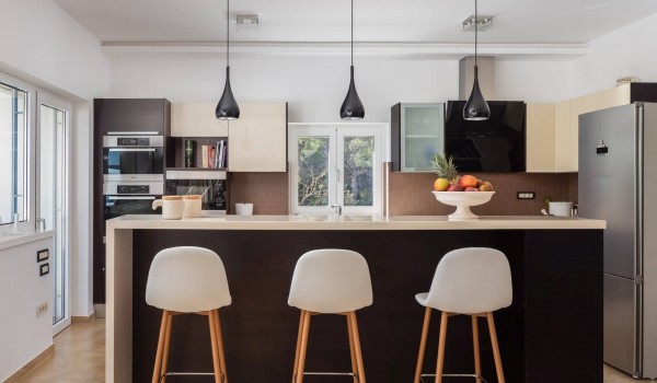 Kitchen with kitchen island in the Luxury holiday villa with indoor heated pool in Sibenik