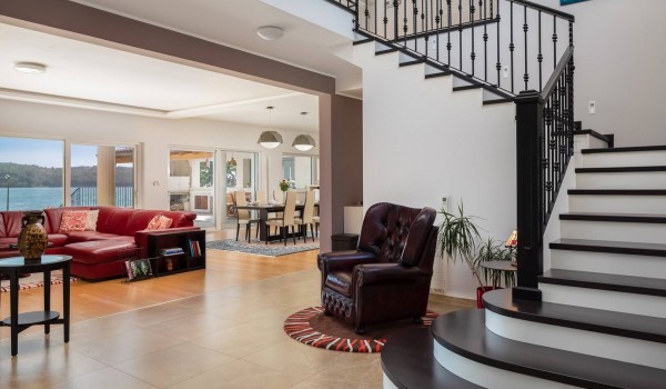 Seating area by the staircase in the Sibenik luxury villa by the sea for family vacation