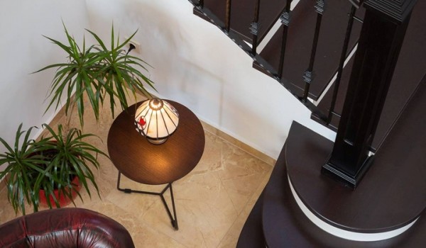 Seating area by the staircase of the luxury beachfront villa for family vacation in Sibenik