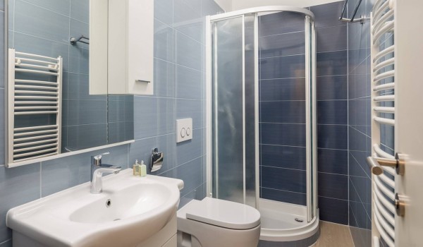 Bathroom with shower, sink and toilet in the Luxury family villa with gym, sauna and jacuzzi