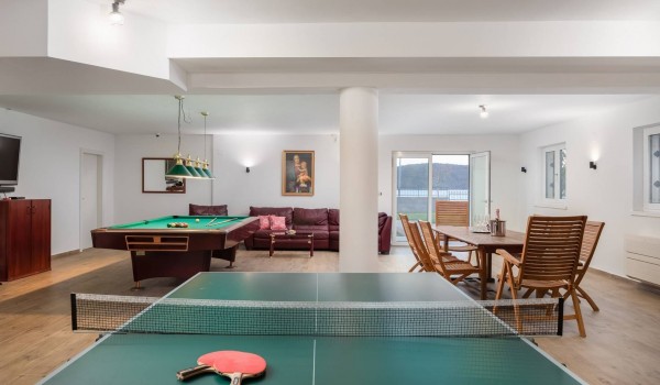 Table tennis and billiard table in a game room of a luxury vacation villa in Sibenik with concierge service and jacuzzi
