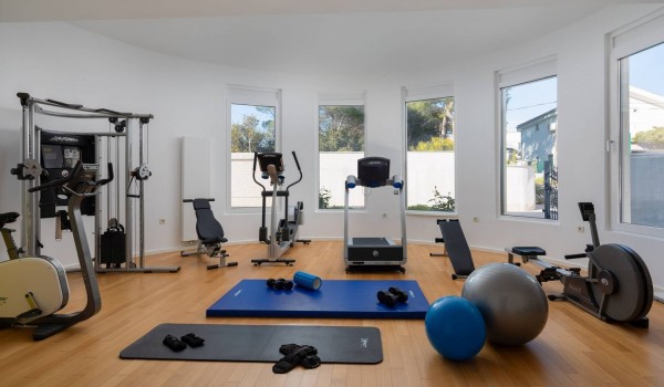 Indoor gym with various equipment in the Sibenik luxury villa Sea Whisper with private pool, sauna and jacuzzi