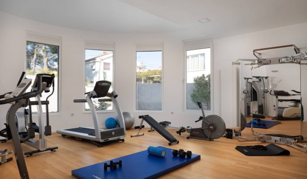 Indoor gym with various equipment in the Sibenik luxury villa Sea Whisper with private pool, sauna and jacuzzi