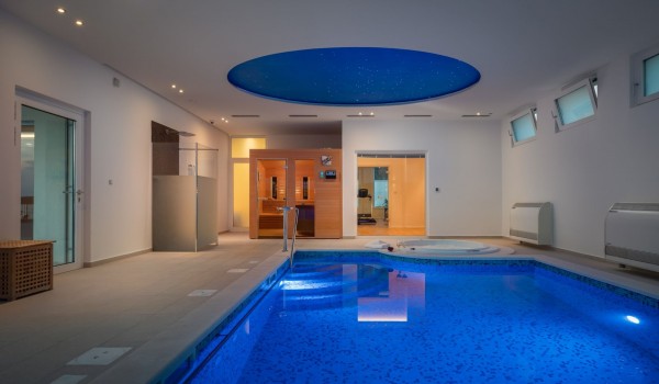 Indoor heated pool and jacuzzi of a luxury beachfront villa for vacation with family and friends in Sibenik