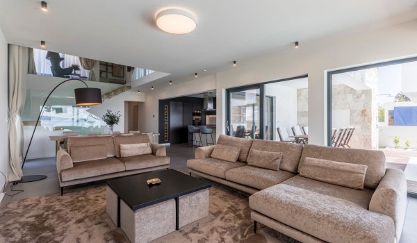 Living room with comfortable sofas in the modern vacation villa with private pool in Split