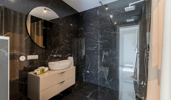 Bathroom with marble flooring in the luxury family villa with pool and parking in Split with total privacy