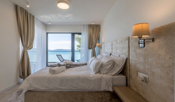 Bedroom with private terrace of the vacation villa Papillon with infinity pool in Split with total privacy
