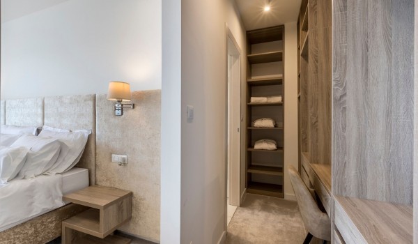 Working space and closet in the bedroom of the luxury villa with private pool by the sea with total privacy