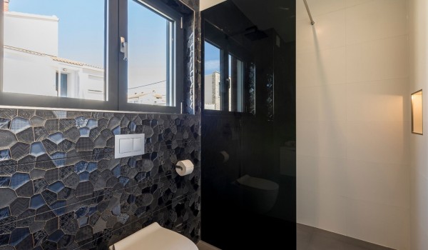 Bathroom with walk-in shower and toilet in the luxury villa for family vacation by the sea with total privacy