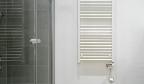 Walk-in shower in en suite bathroom in bedroom of a luxury family villa with private swimming pool and parking