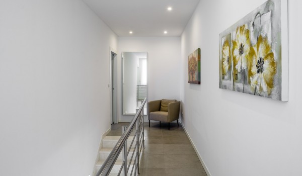 Hallway on the first floor of a luxury beachfront villa with private swimming pool and parking