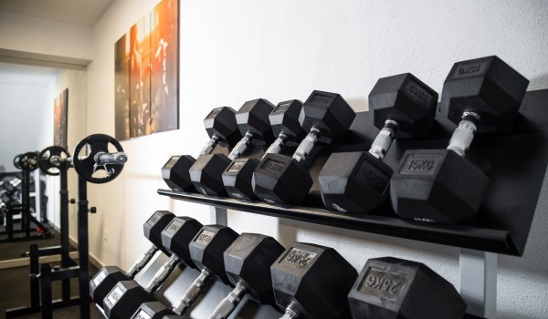Dumbbells in a private gym of a luxury vacation villa Ciovo Joy 3 with swimming pool and parking