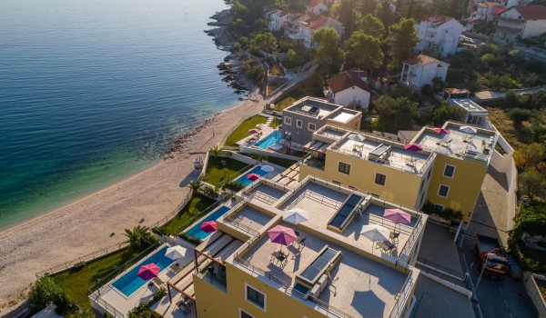Aerial view of luxury beachfront villa Ciovo Joy 3 with private pool and gym in Ciovo with total privacy
