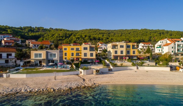 View of a Croatian luxury beachfront villa for family vacation in Ciovo with total privacy