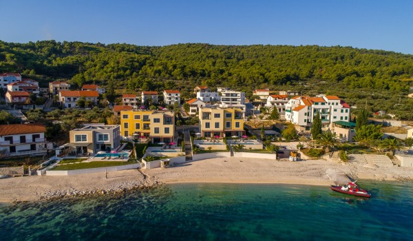 View of a Croatian luxury beachfront villa for family vacation in Ciovo with total privacy