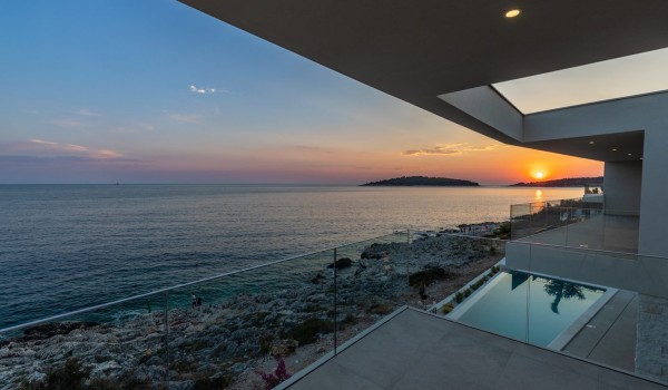 View of the beach and the sea next to the Croatia luxury vacation villa Supreme Rogoznica 2 in Rogoznica