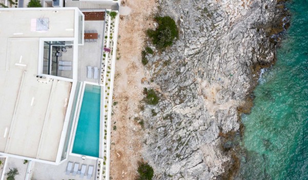 View of the property of a luxury villa with a private pool and an outdoor terrace overlooking the sea Supreme Rogoznica 2 in Rogoznica