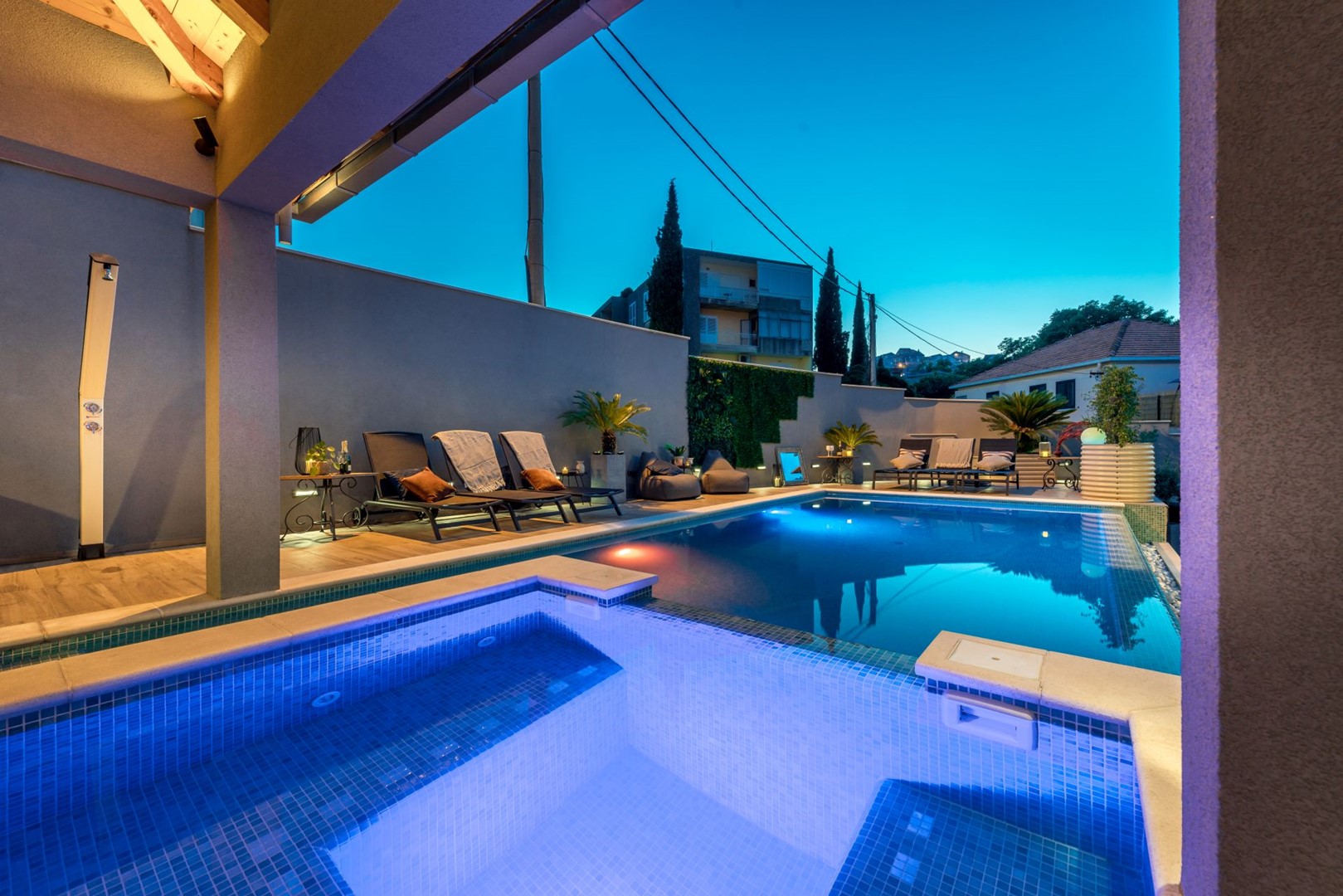 Luxury villa Lapad Entrez in Dubrovnik with outdoor pool and deck chairs