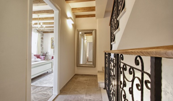 Air conditioned interior of the first floor and the elegant internal staircase of the luxury villa for vacation rent near Dubrovnik