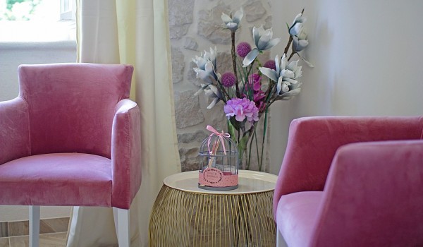 Charming pink armchairs in the air conditioned bedroom with a king size bed and in the luxury Dubrovnik villa Cavtat Iliria