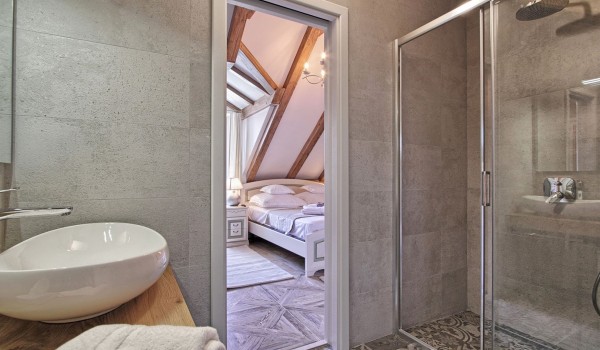 Luxurious bathroom in the attic of the historic stone villa Cavtat Iliria for a family rent and vacation near Dubrovnik