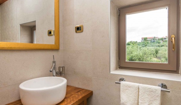 Sink in a bathroom of a Croatian luxury family villa with concierge service and parking
