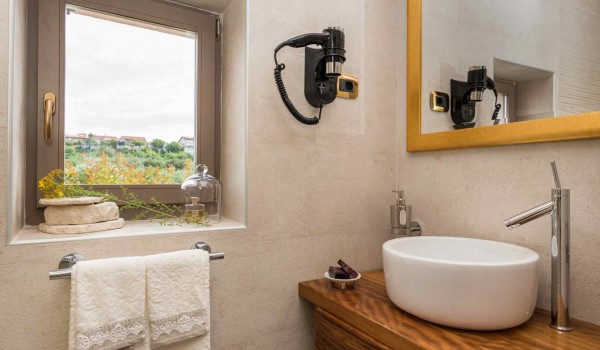 Sink in a bathroom of a luxury Skradin villa with heated pool, jacuzzi and sauna