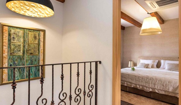 View of a bedroom in a luxury pet-friendly villa Finessa Skradin 1 with  heated pool, sauna and jacuzzi