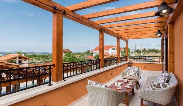 Outdoor seating area on the terrace of a luxury Croatian villa for families with kids with complete privacy
