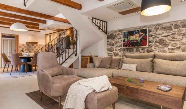 Living room with comfortable sofas on the ground floor of a luxury Croatian villa Finessa Skradin 1 with concierge service