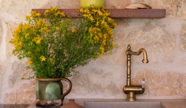 Sink in a summer kitchen of a luxury family villa for vacation with pets in Skradin with complete privacy