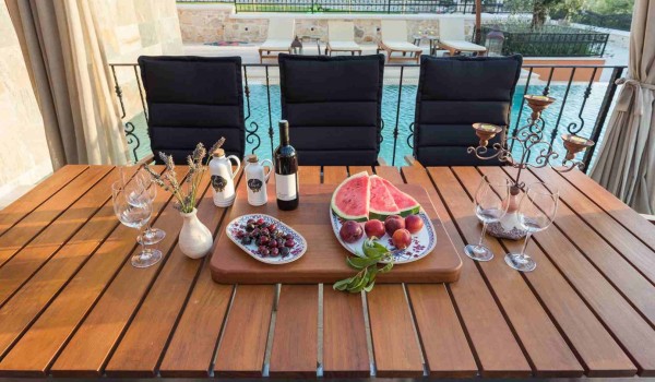 Refreshments on an outdoor table of a luxury villa for family vacation in Skradin