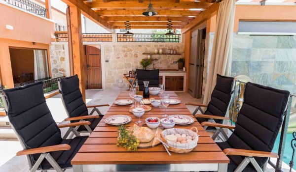 Dinner on the table in a Croatian luxury vacation villa with concierge service in Skradin