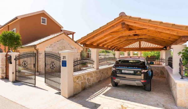 Covered parking place of a luxury pet-friendly villa Finessa Skradin 1 with concierge service