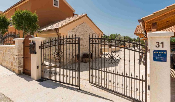 Entrance to the estate of a luxury Croatian villa for family vacation in Skradin with complete privacy