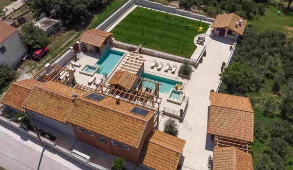 Aerial view of Croatian luxury villa Finessa Skradin 1 with private pool, jacuzzi, sauna and private garden with complete privacy