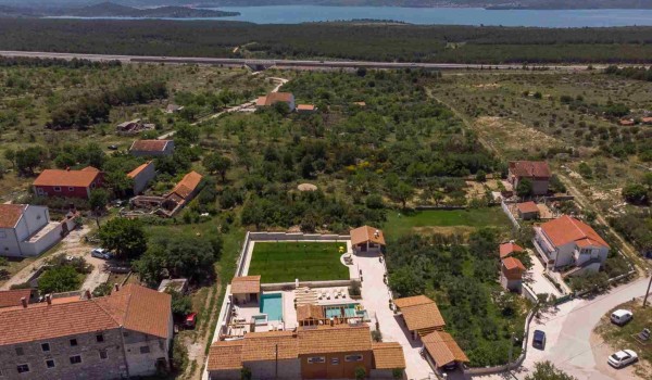 Aerial view of luxury private holiday villa Finessa Skradin 1 with private pool, jacuzzi, sauna and private garden