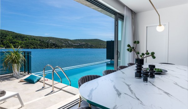 View from the inside of Croatia luxury sea view villa on the private terrace with pool for vacation