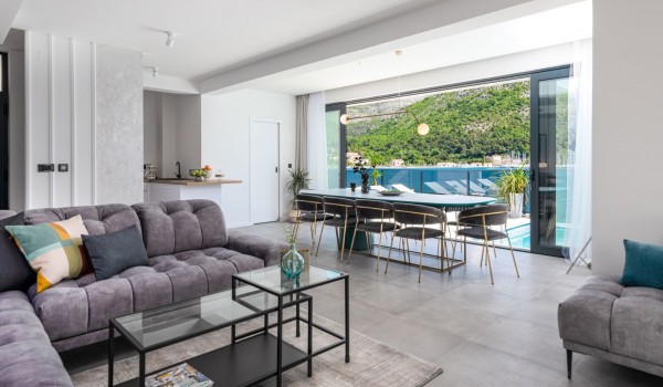 Living room area of Croatia luxury pool villa with sofas and coffee table for vacation and rent with friends