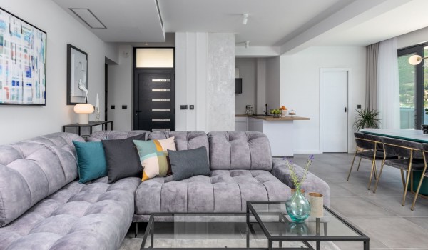 Living room area of Croatia luxury beachfront villa with modern design sofa and coffee table for rent