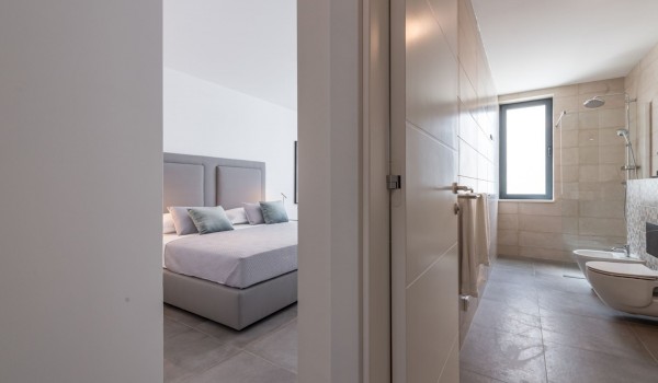 Bedroom of Croatia luxury rental villa with private bathroom with shower for family vacation in Dubrovnik