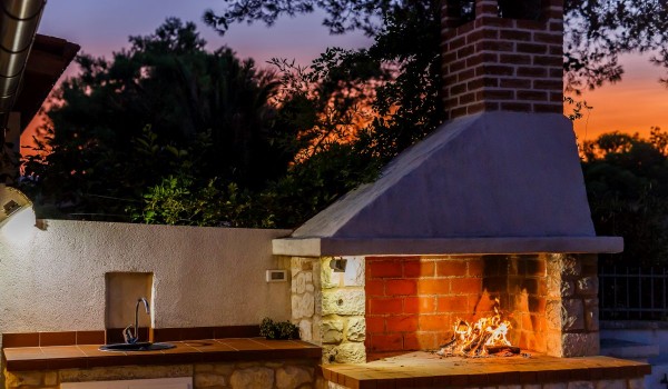 Outdoor grill on the terrace of the traditional beachfront villa with private parking on Brac island