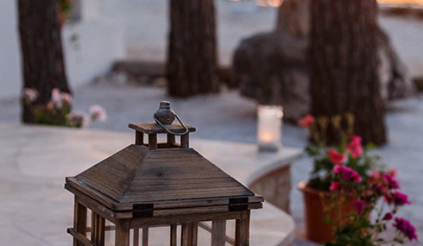 Lantern illuminating the terrace of the traditional  Croatia beachfront villa for romantic vacation on Brac island