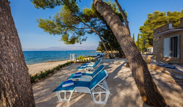 Deck chairs with beach view in the traditional holiday house on Brac island with private parking