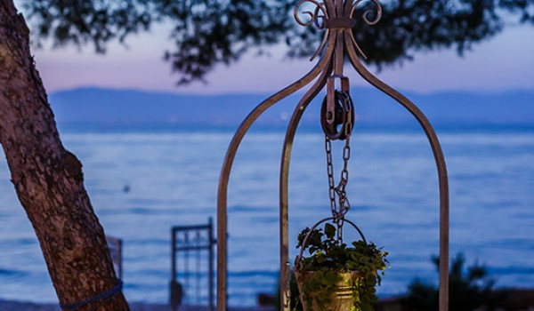 Well in the courtyard of the Croatia family vacation villa at the beach on Brac island