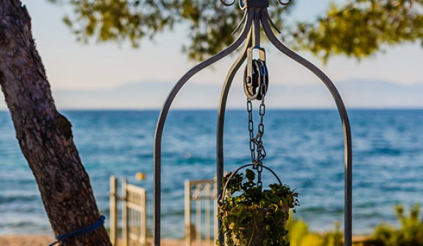 Well in the courtyard of the Croatia family vacation villa at the beach on Brac island