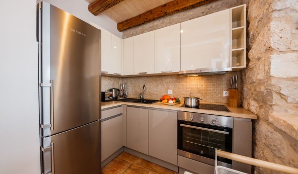 Cute fully equipped kitchen in the traditional stone house by the sea on Brac island