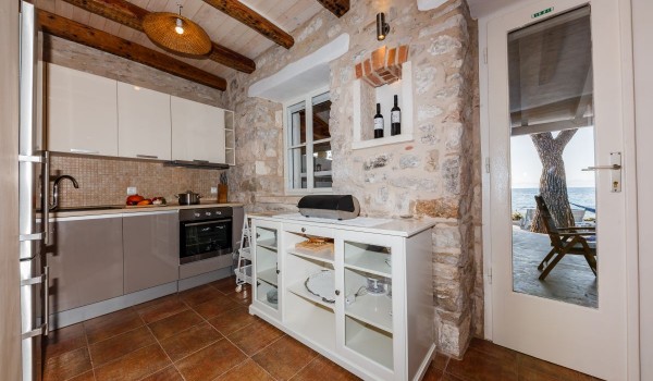 Cute fully equipped kitchen in the traditional stone house by the sea on Brac island