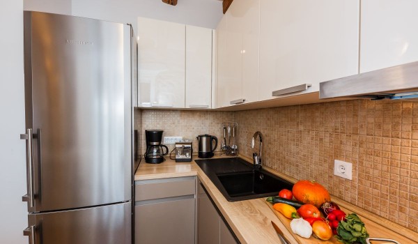 Charming kitchen in the traditional holiday villa for family vacation at the beach