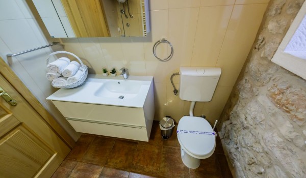 Bathroom of a traditional stone villa Summer Retreat with private parking and wifi